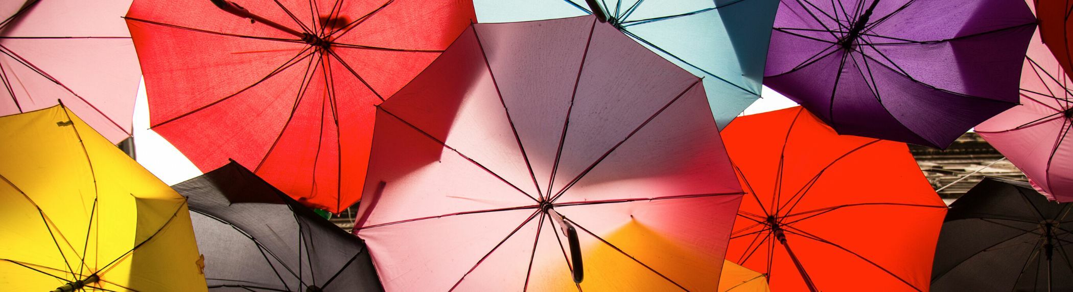 Image of colorful open umbrellas